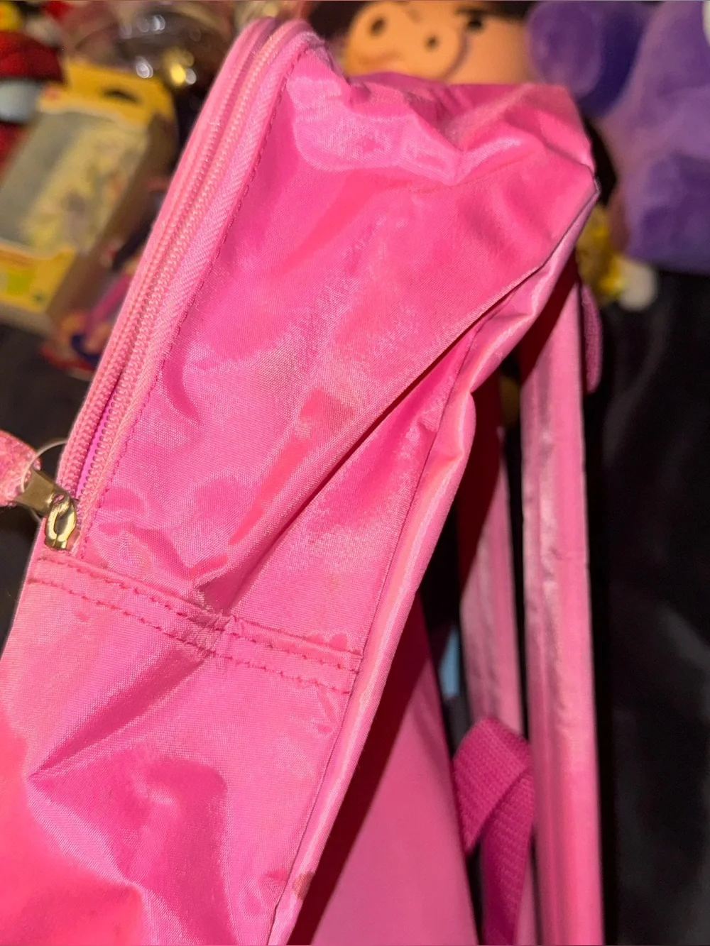 Care Bears pink backpack flaws